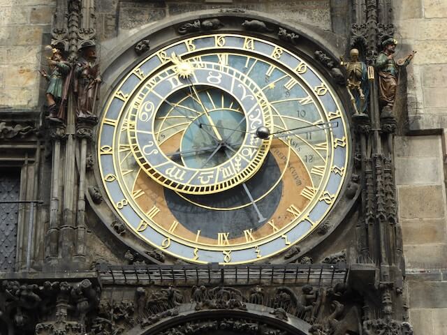 A clock on a buildingDescription automatically generated