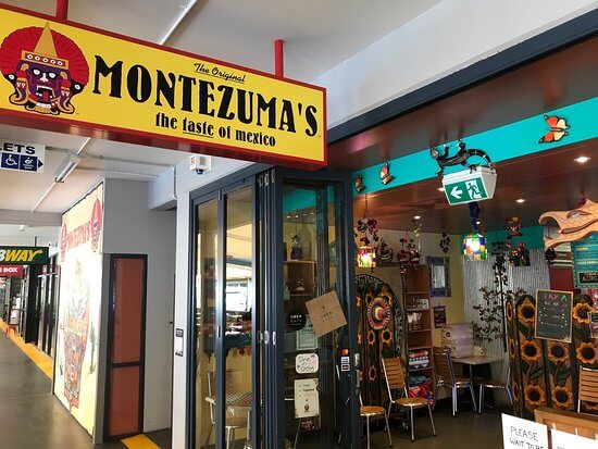 A storefront with a sign

Description automatically generated