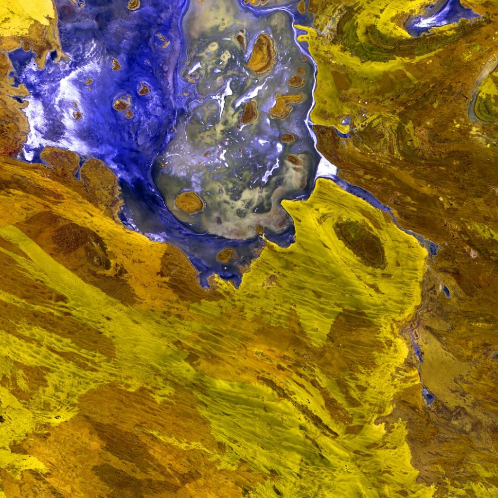 a close up of a yellow and blue substance