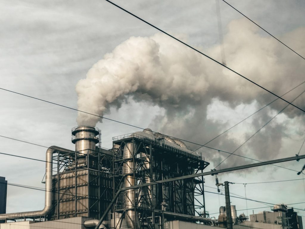 black and white smoke on train rail